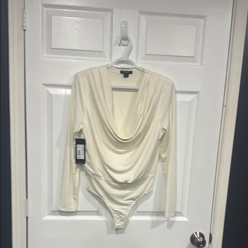 Marciano by Guess Body Suit
Cowl Neck
NWT
Size Large
White